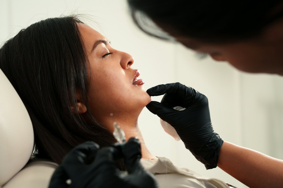 Woman receiving a skin booster injection